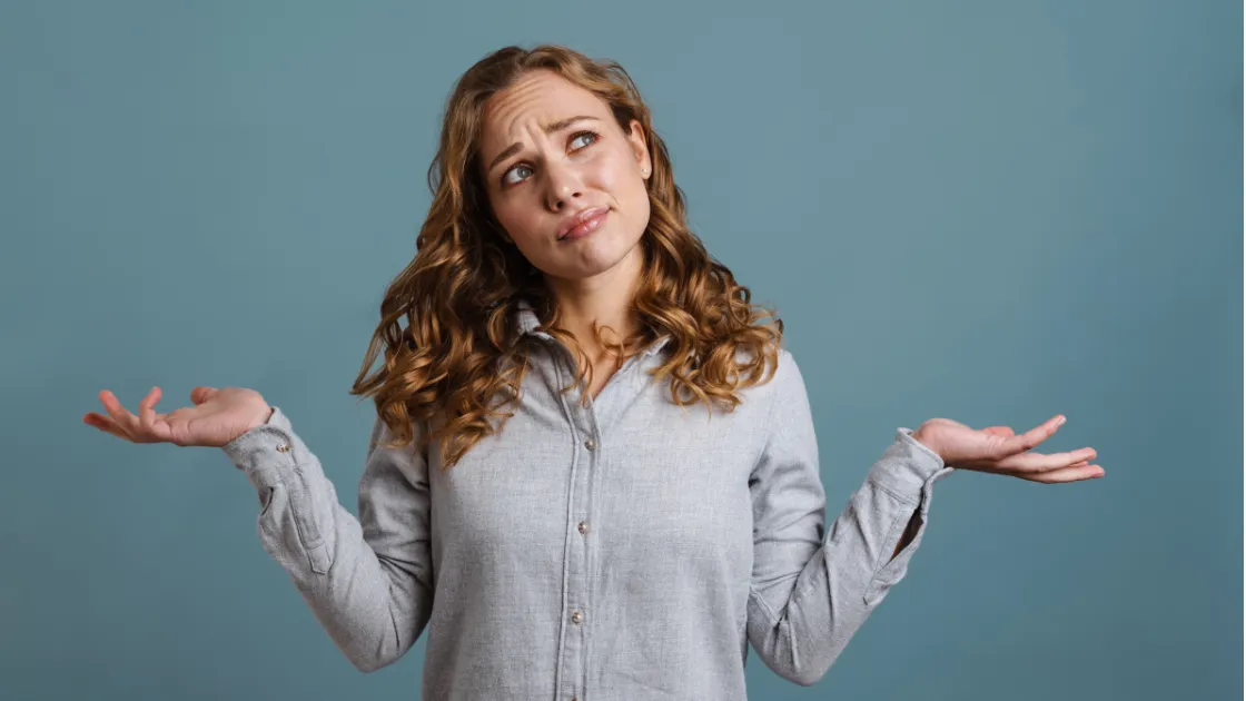 Akron small business owner shrugging, unsure whether their marketing is working